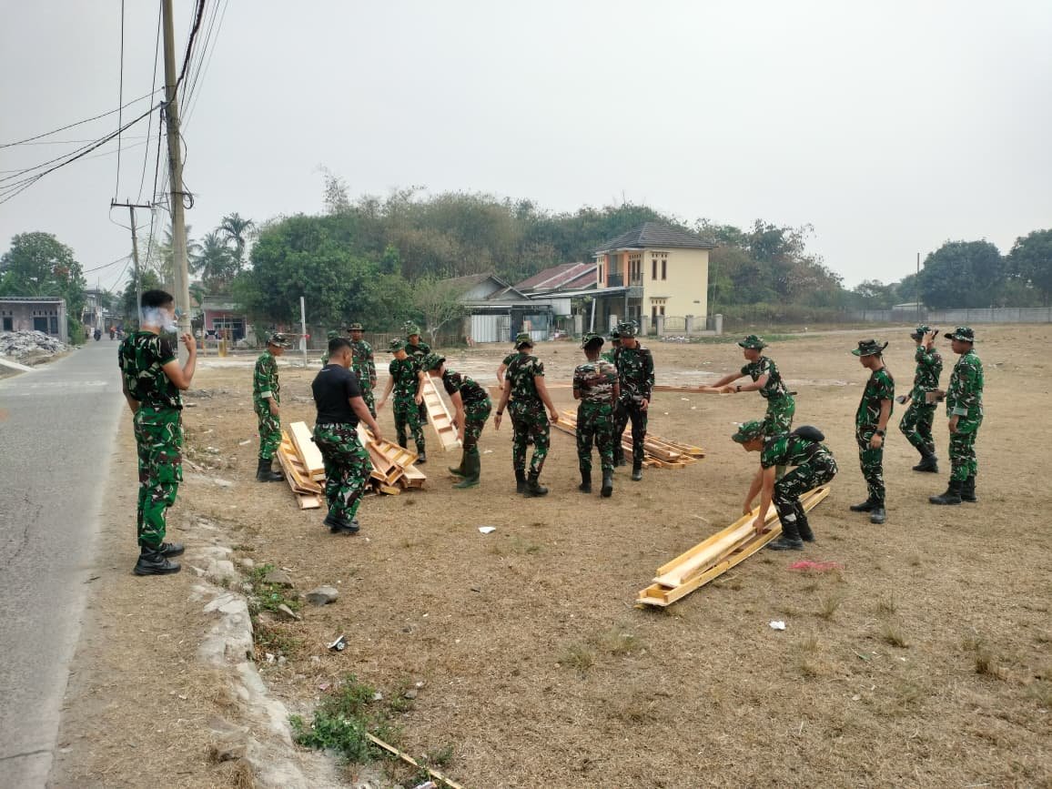 Mobilisasi Bekisting: Katalis Pembangunan Efisien dalam Program TMMD